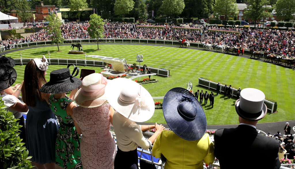 Racegoers look over
