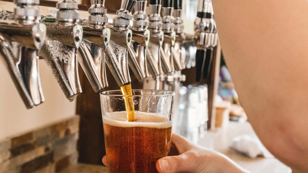 beer tap and pint of beer at the Brewery Tour and Tasting