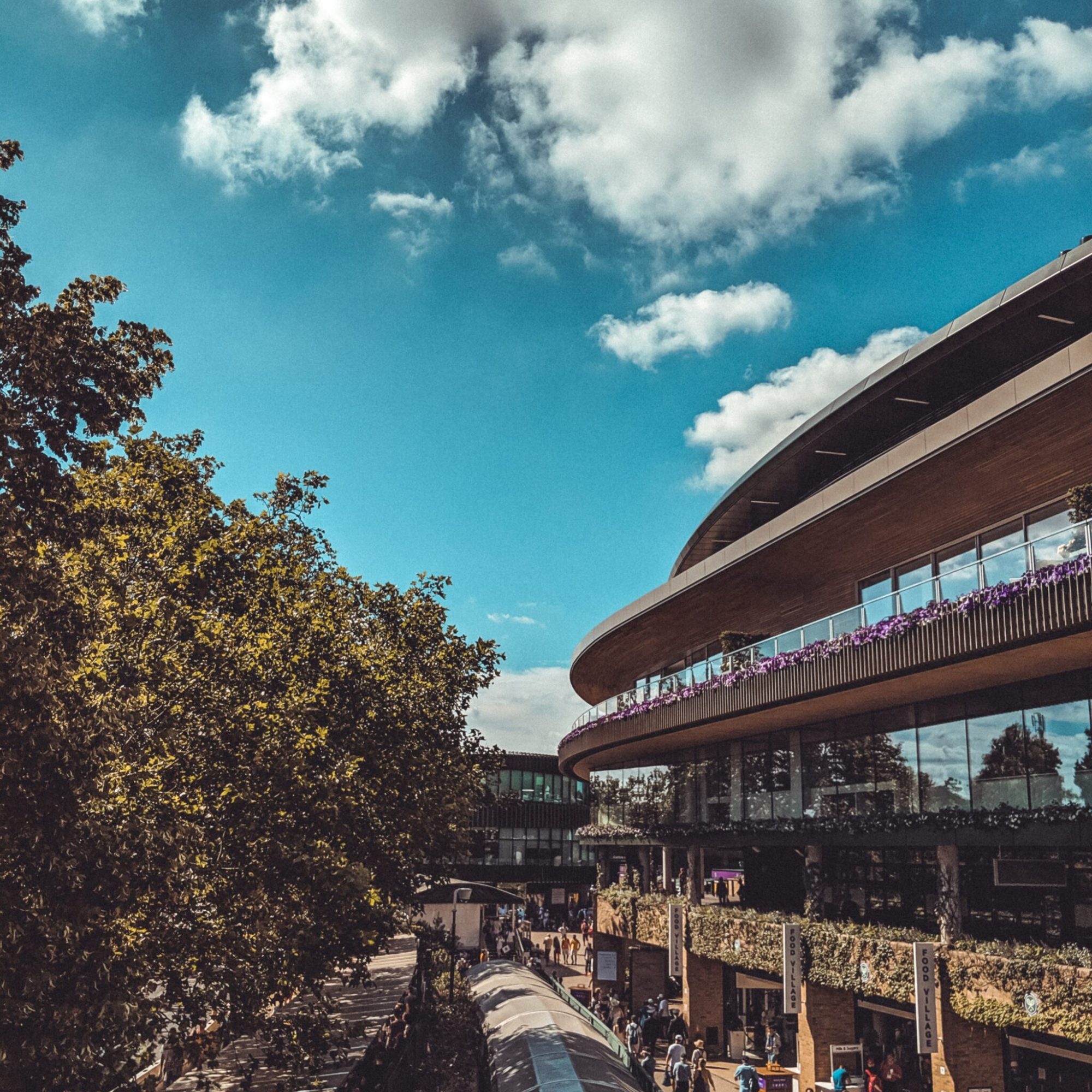view of Wimbledon Tennis Building with blue skies